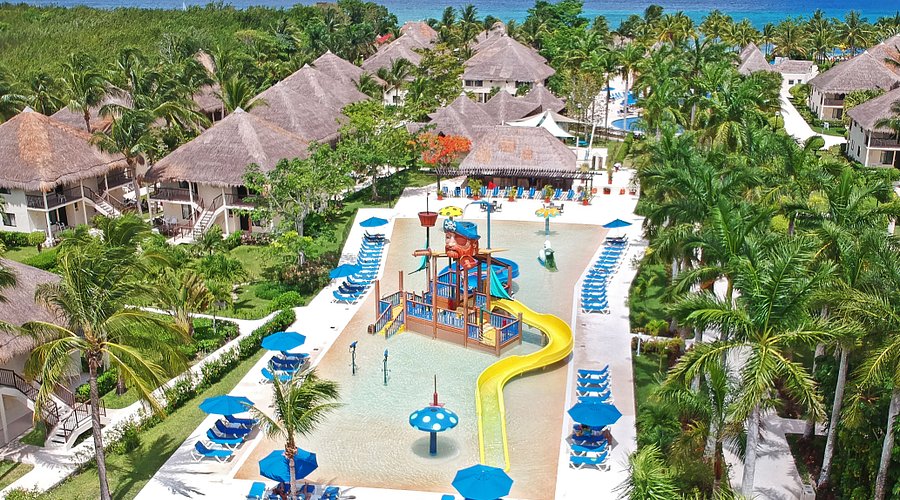 Allegro Cozumel all-inclusive resort with beachfront palapas, pools, and tropical Caribbean setting.