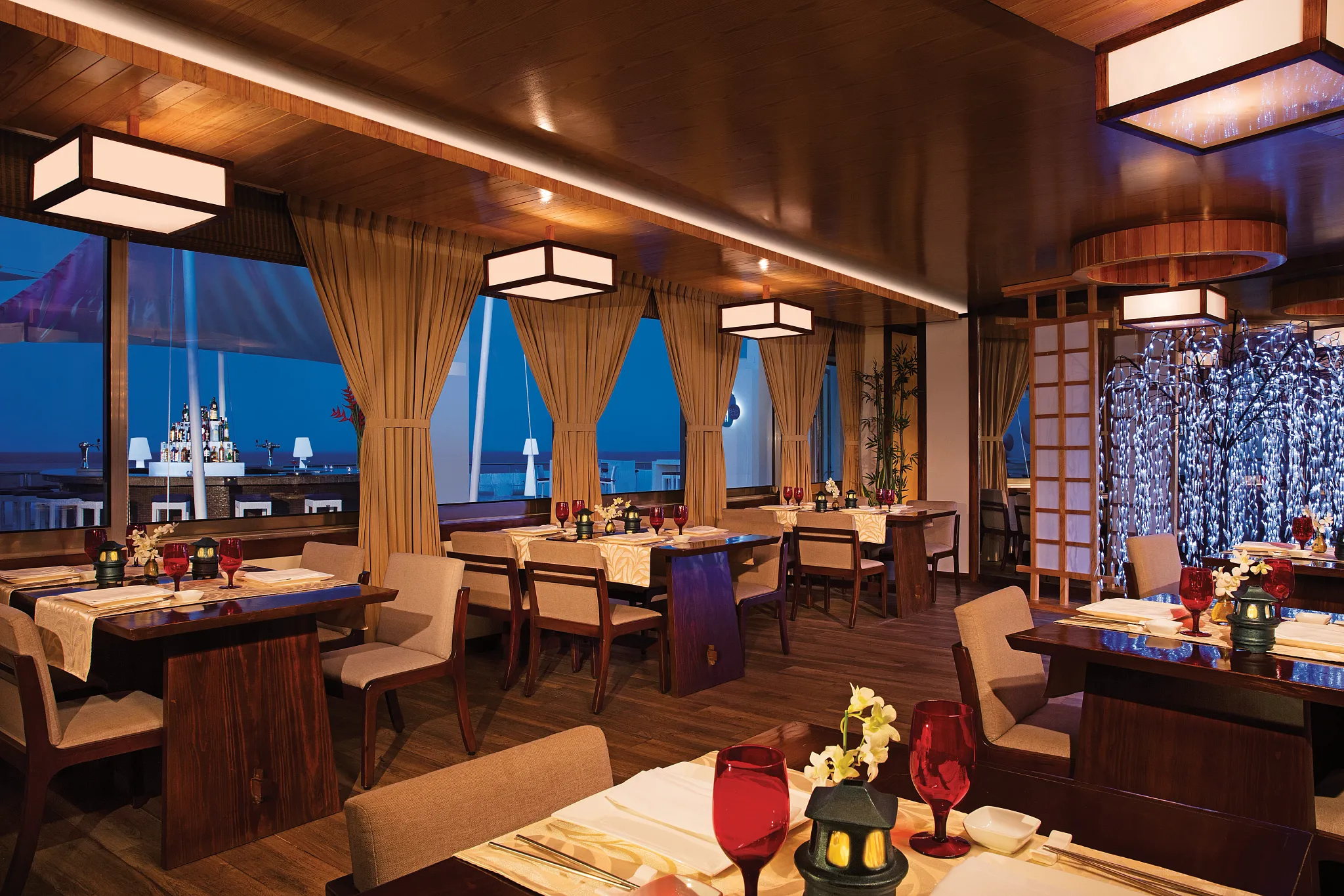 Gohan Sushi Bar at Secrets Aura Cozumel featuring fresh sushi, elegant dining, and an ocean-view teppanyaki table experience.
