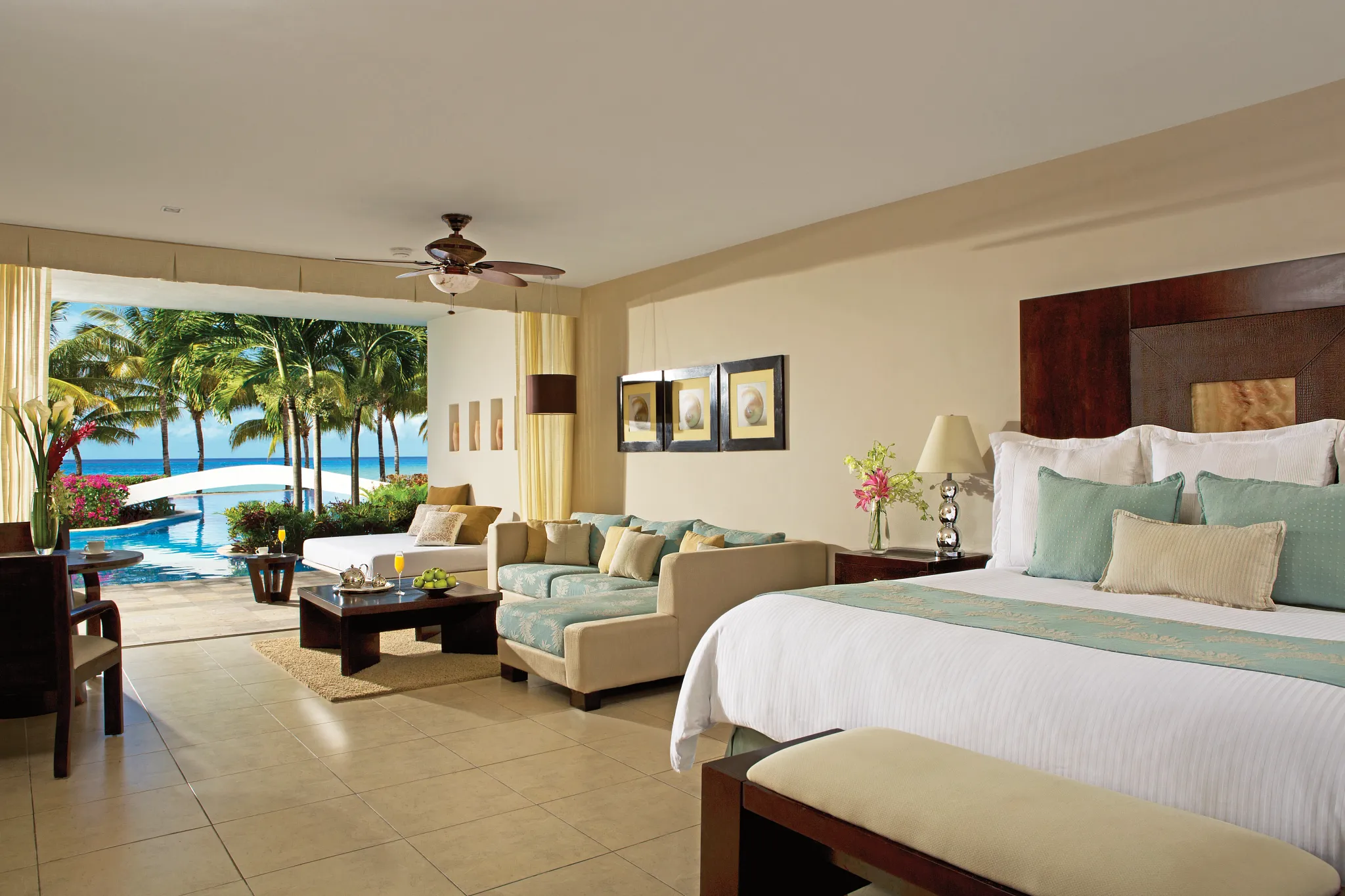 Junior Suite Swim-Up Ocean View with king bed and direct pool access at Secrets Aura Cozumel.