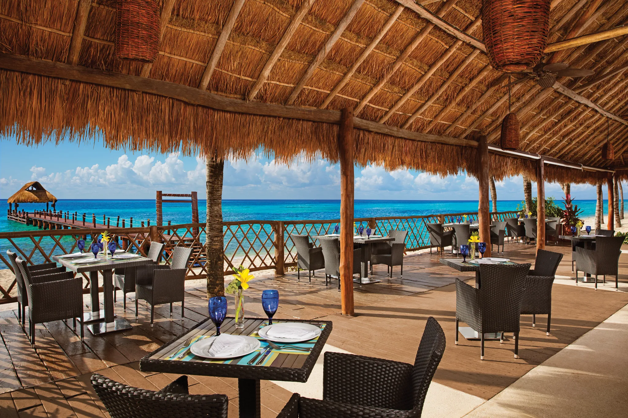 Oceana seafood restaurant at Secrets Aura Cozumel featuring oceanfront outdoor dining, fresh seafood dishes, and Caribbean views.
