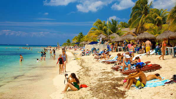 Palancar Beach near Secrets Aura Cozumel with pristine white sand and clear turquoise waters ideal for snorkeling