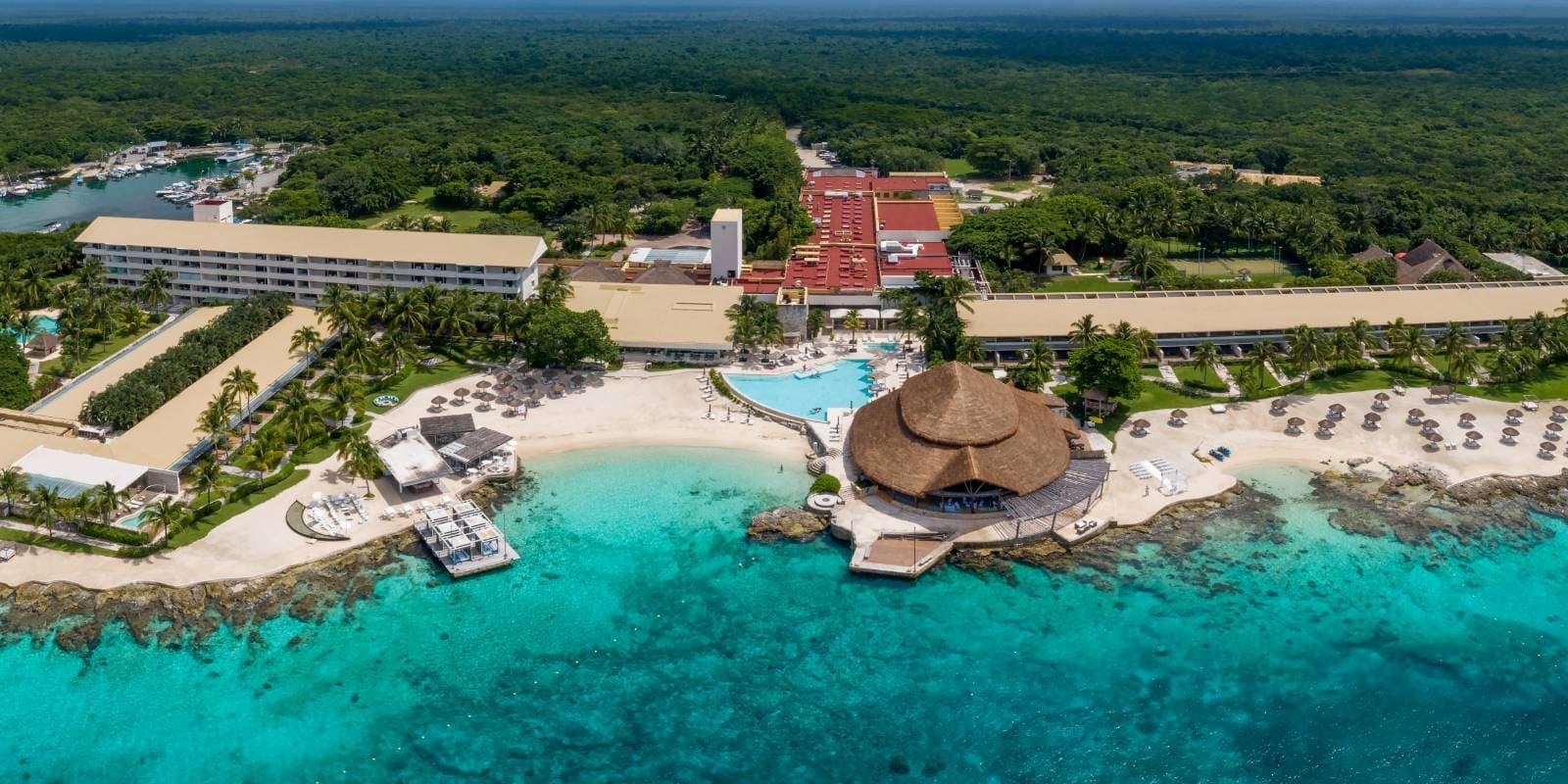 Presidente InterContinental Cozumel Resort and Spa luxury beachfront resort with clear turquoise water and private beach in Cozumel, Mexico.