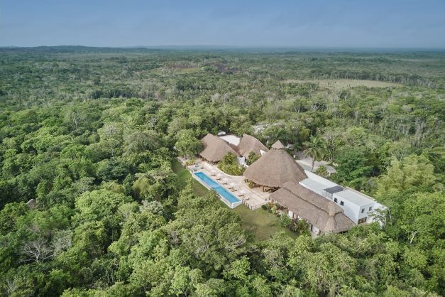 The Explorean Cozumel boutique all-inclusive resort surrounded by jungle with adventure excursions, intimate villas, and nature immersion.
